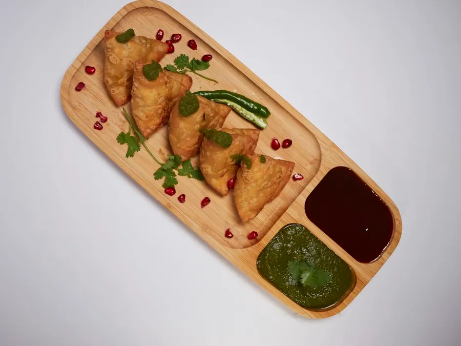 Foto referencial: Sopaipillas con pebre de cochayuyo